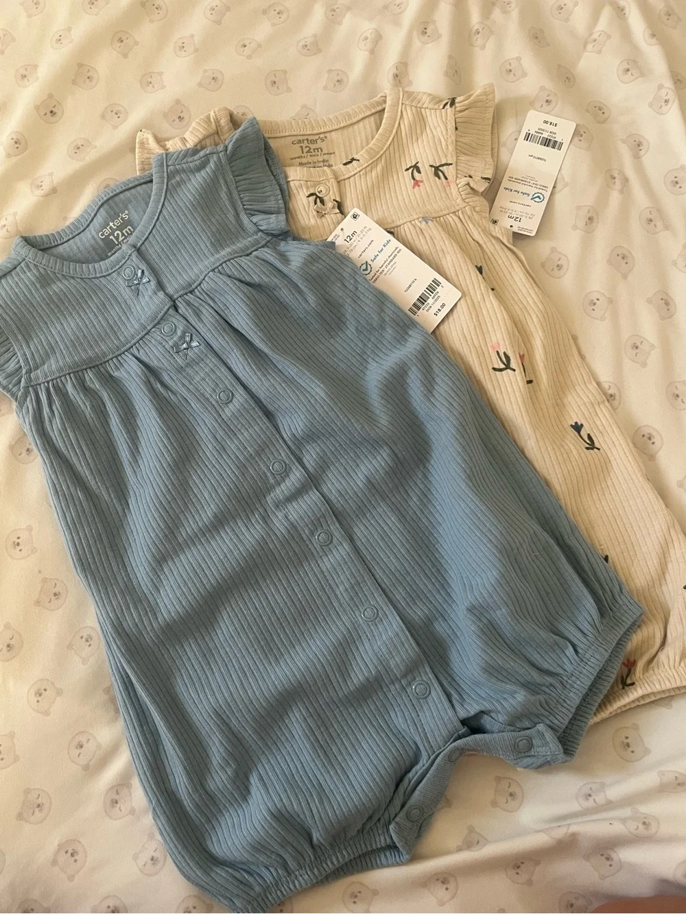 2 Carter's Ribbed Romper and a Cloud Island Romper size 12m